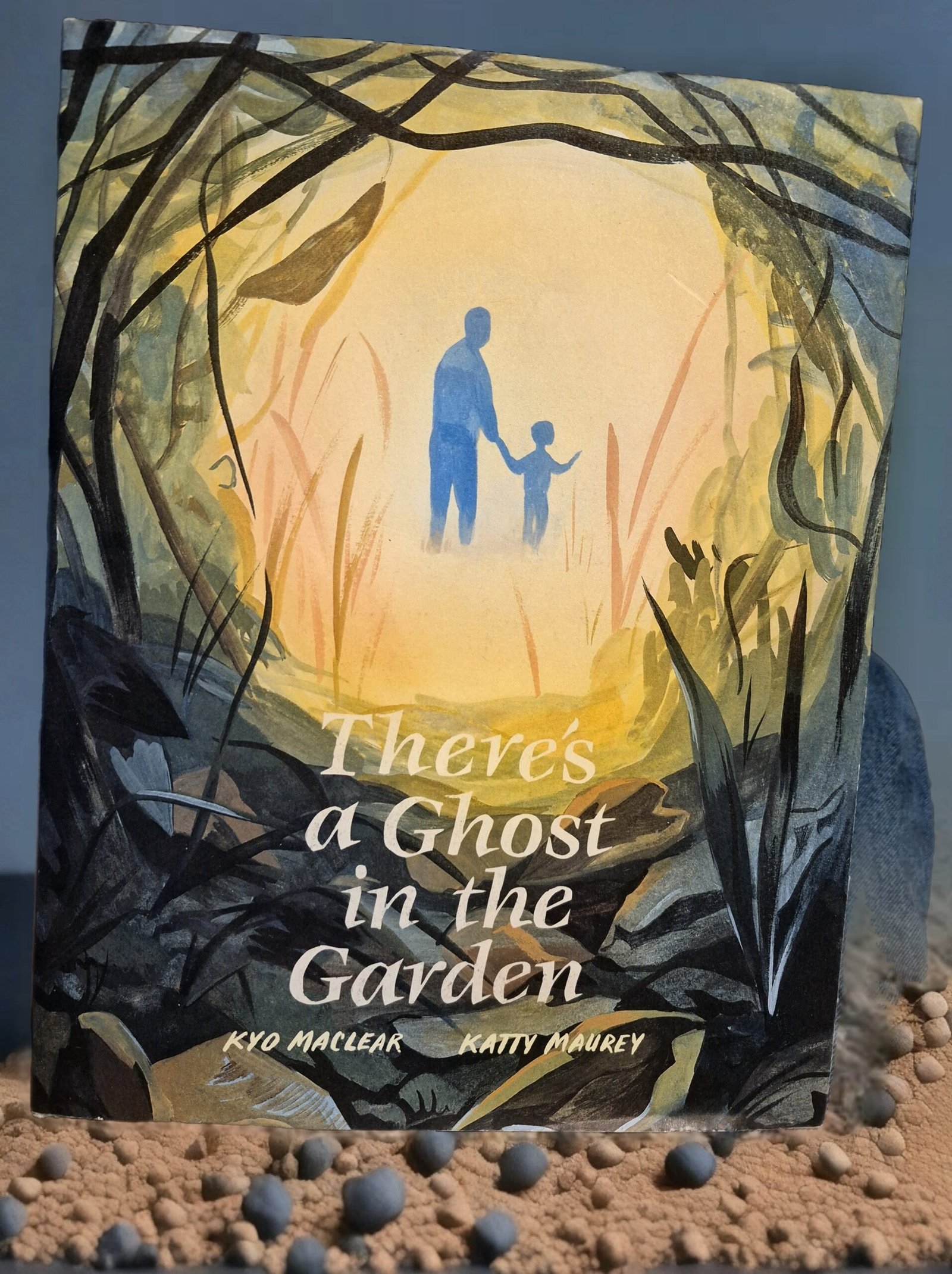 There's A Ghost in the Garden by Kyo Maclear and Katty Maurey-Excellent Condition